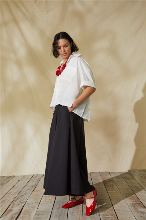 Victoria C. Camisa blanca oversize