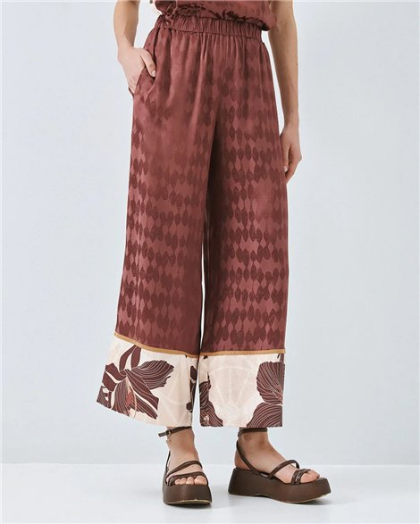 Acces Pantalón palazzo doble estampado cobre