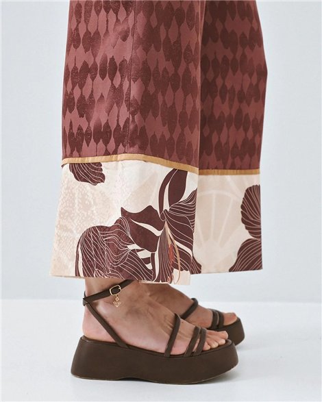Acces Pantalón palazzo doble estampado cobre