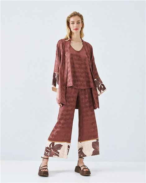 Acces Pantalón palazzo doble estampado cobre
