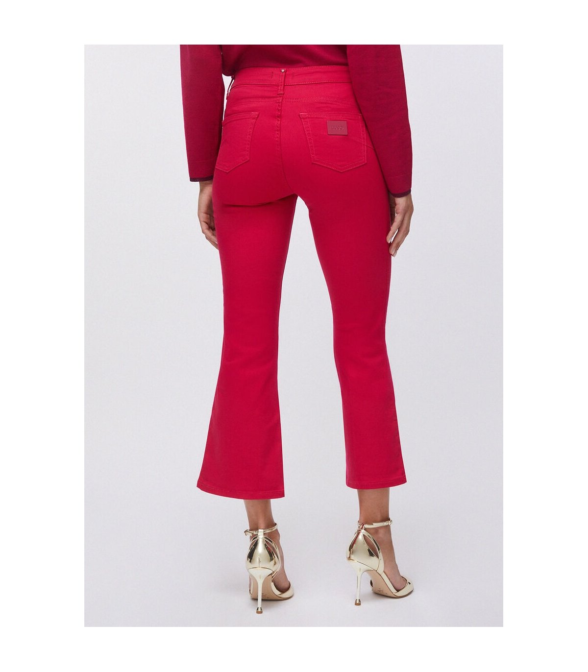 Liu Jo Pantalón color fresa acampanado con botones logotipo