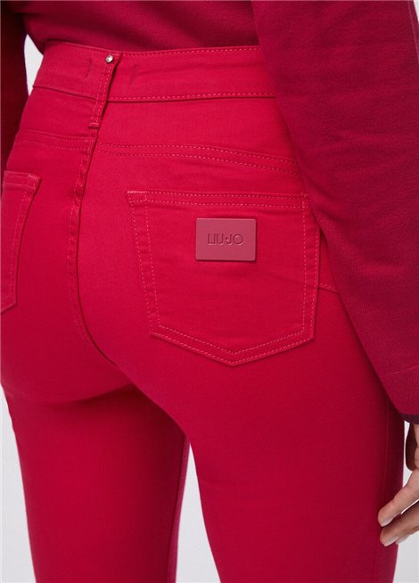 Liu Jo Pantalón color fresa acampanado con botones logotipo