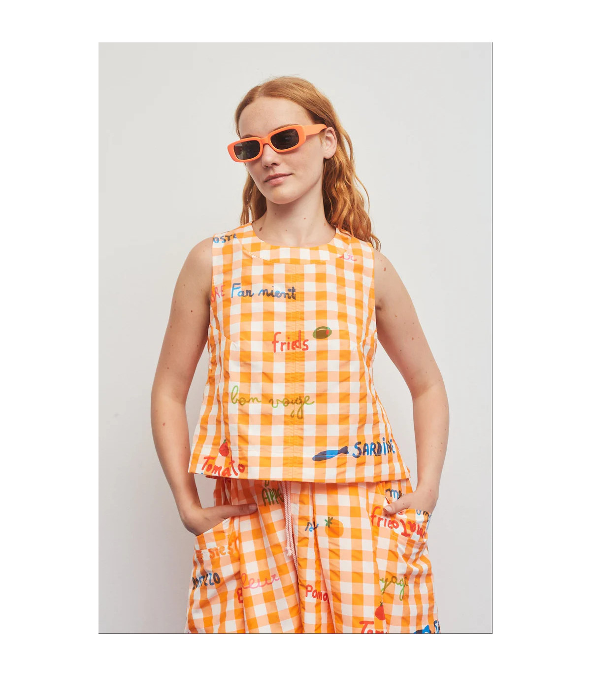 Dr Bloom Blusa de cuadros naranja sin mangas con aberturas