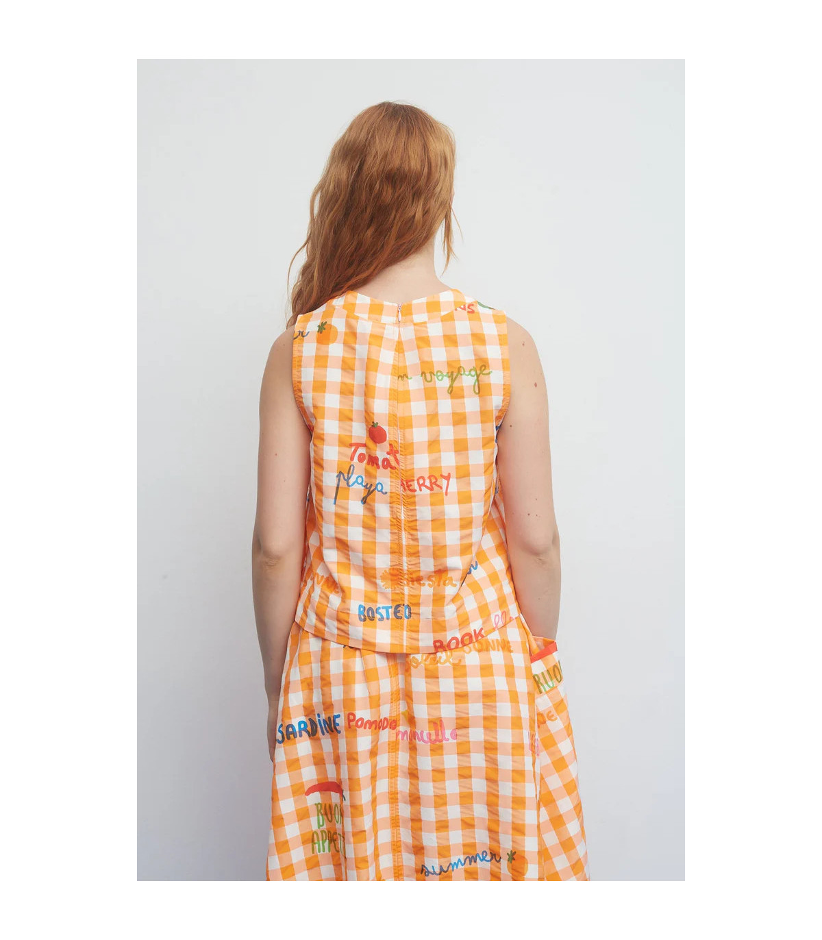 Dr Bloom Blusa de cuadros naranja sin mangas con aberturas