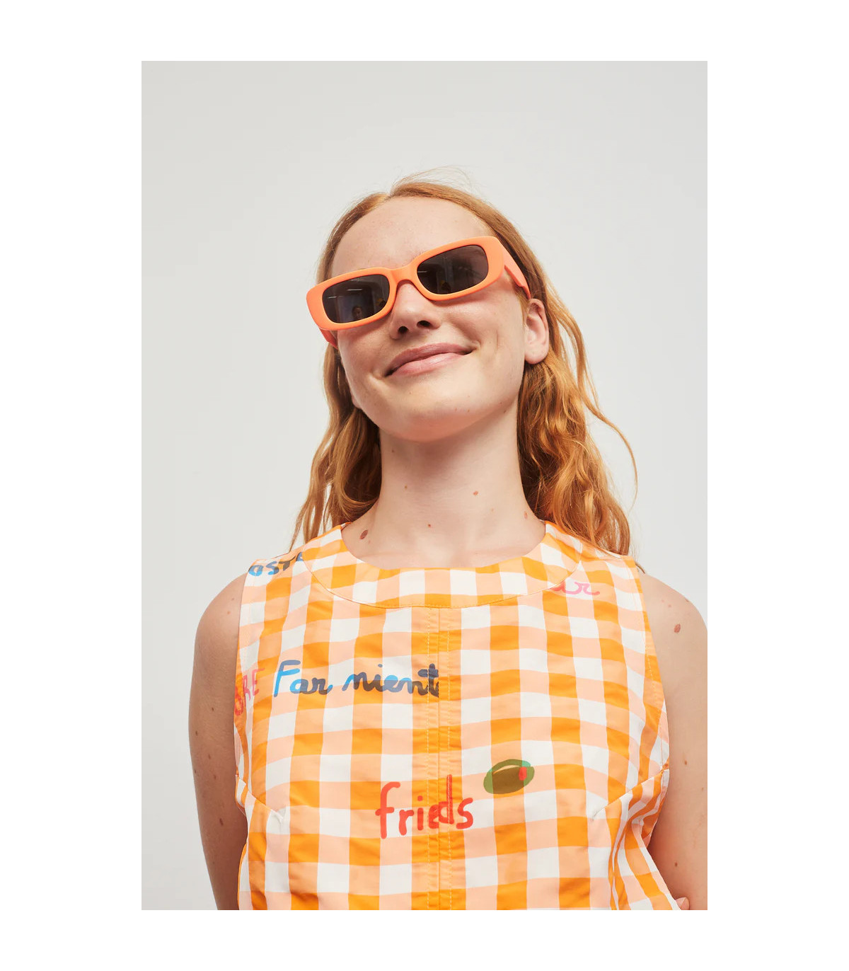 Dr Bloom Blusa de cuadros naranja sin mangas con aberturas