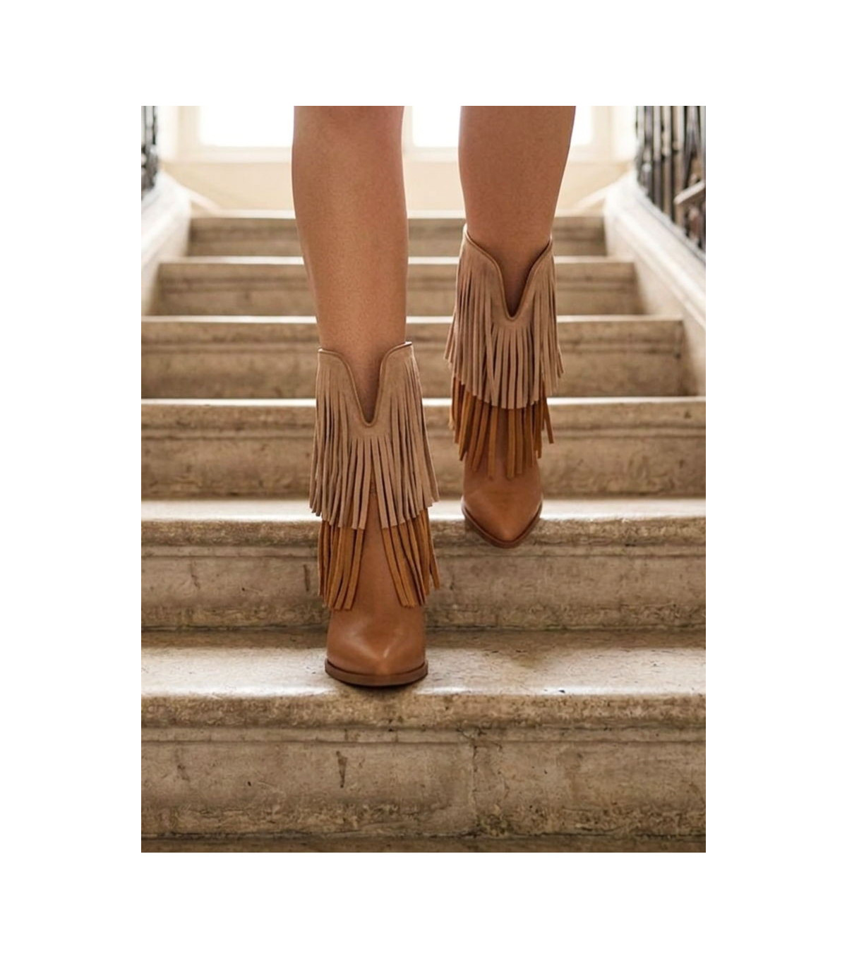 Felmini Botas cowboy de tacón con flecos