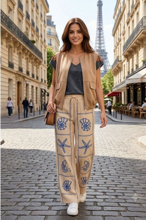 Kélie París Pantalón beige de algodón con bordado océano