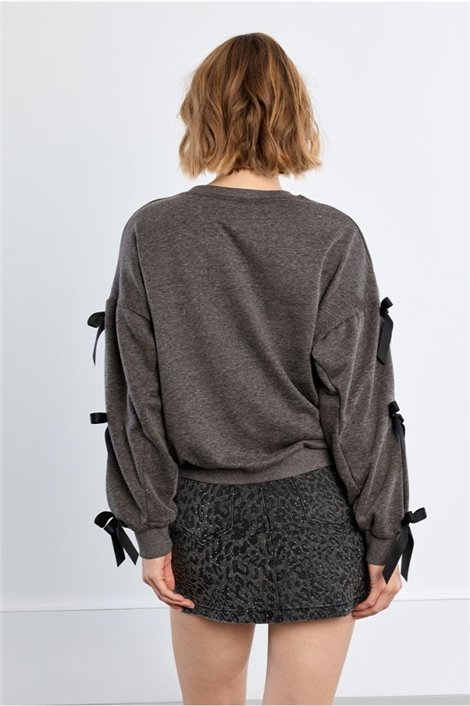 Lili Sidonio Jersey gris detalle lazos