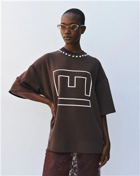 Acces Camiseta oversize con tachuelas